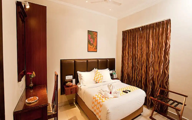 Blossoms Hotel and Service Apartment