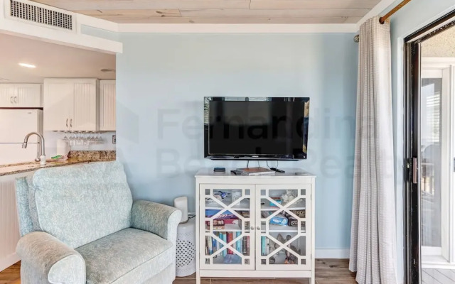 Newly Remodeled Oceanfront Condo with Salt Water Pool and Private Walkway to Beach by RedAwning