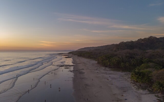 Tramonto ROJO Santa Teresa Guest House
