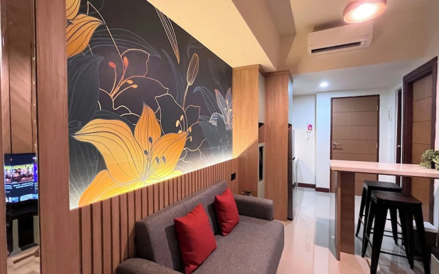 Warm And Homey 2Br At Vida View Makassar Apartment