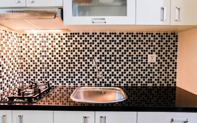 Warm and Homey Studio at The Oasis Cikarang Apartment By Travelio