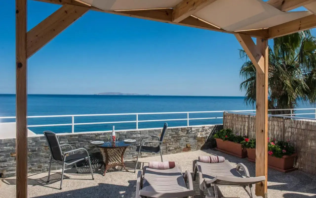 Exclusive Seaside Retreat with Shared Pool & Private Beach Access
