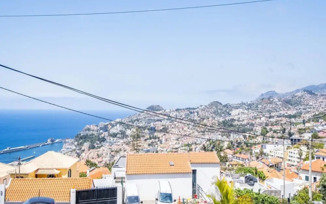 Glimpse of the City by Madeira Sun Travel