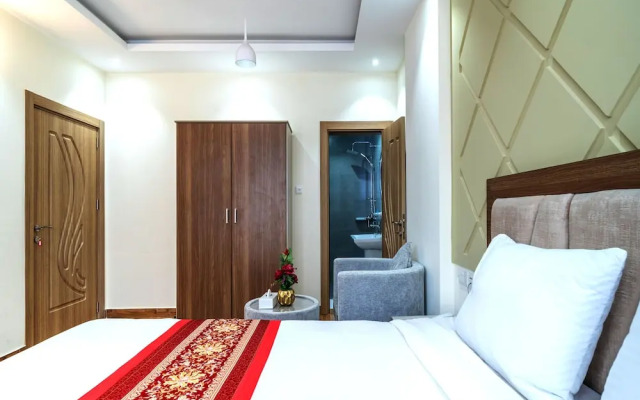 OYO Townhouse 156 Rose Hotel Apartments.