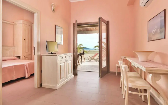 Residence with private beach in Bosa Marina
