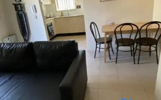 Well-Located 2BR Apartment in Auburn – Walk to Station & Shops