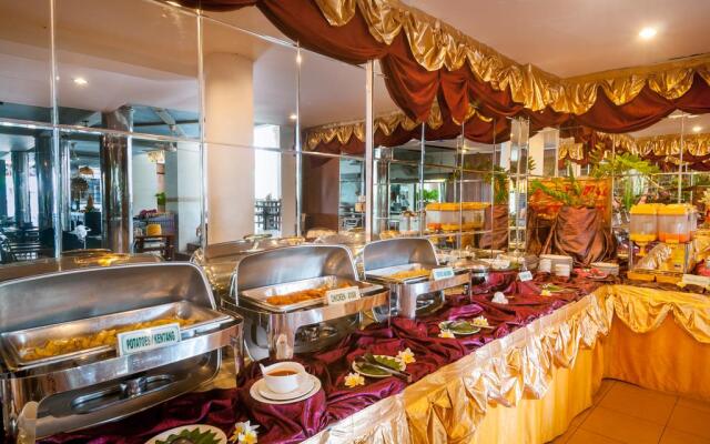 Отель Melasti Kuta Beach Hotel and Spa