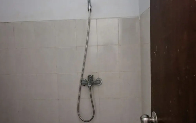 Nida Rooms Gelogor Carik Denpasar at Guest House Orchid