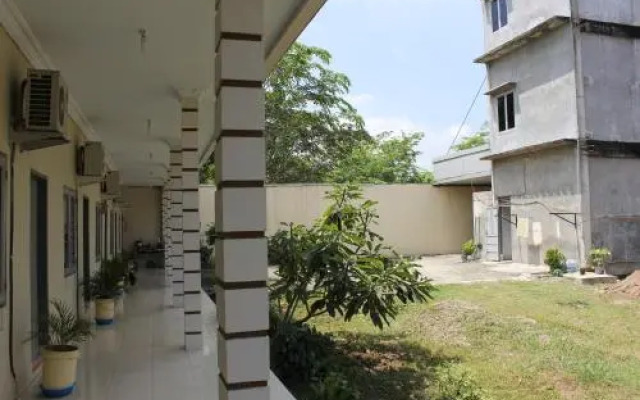 Penginapan Transit Tomato