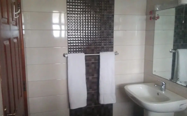 Esao Airport Suites