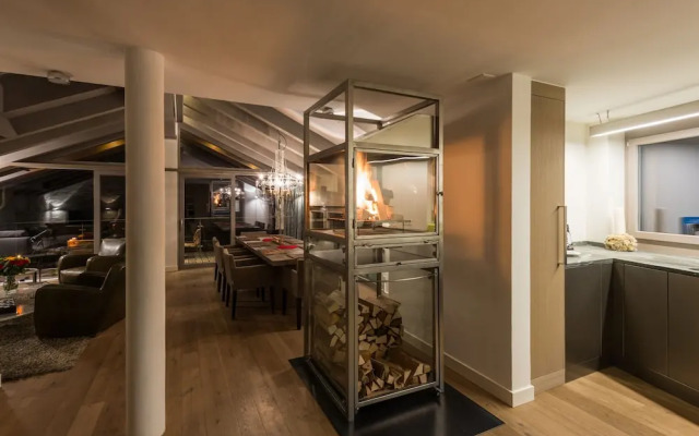 Mountain Exposure Luxury Chalets & Penthouses & Apartments