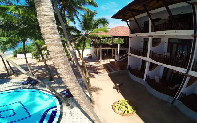 Whispering Palms Hotel