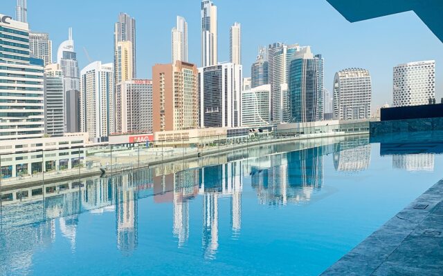 HomesGetaway Cozy 1BR in Binghatti Canal