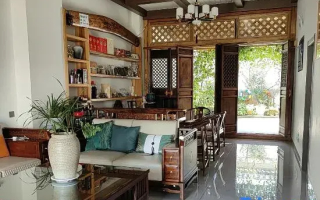 Tengchong Nuanju Homestay (Simola Va Ethnic Village)