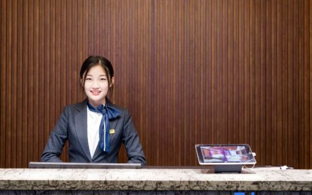 Huada Light Luxury Hotel