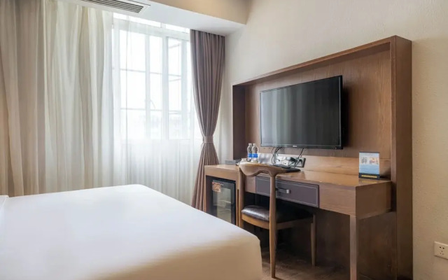 Xingyi Chain Hotel Jiangxia Metro Station