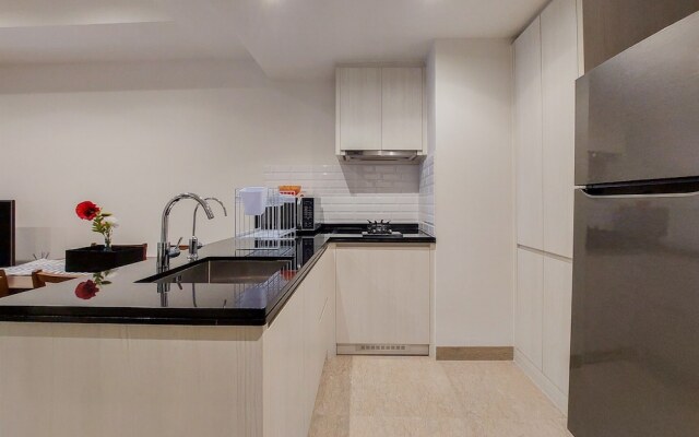 A Luxury 1BR Bali Style Apartment at Branz BSD City