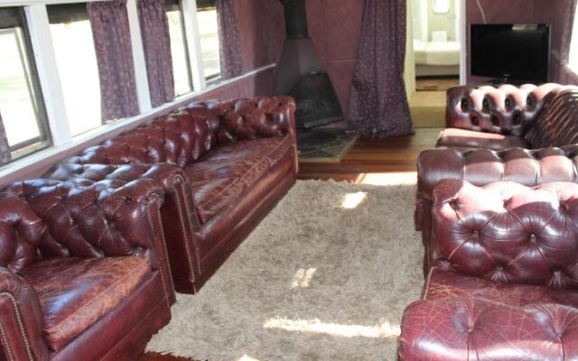 Krinklewood Cottage and Train Carriages