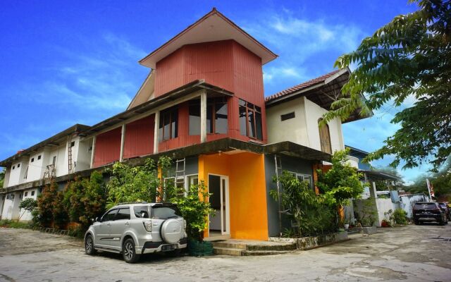 MIM Guest House Syariah by OYO Rooms