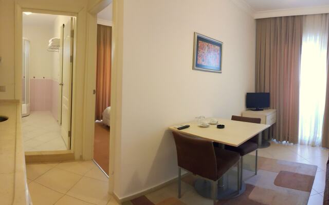 Kamer Suites & Hotel