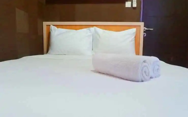 Best View 2BR Apartment at Tamansari Papilio By Travelio