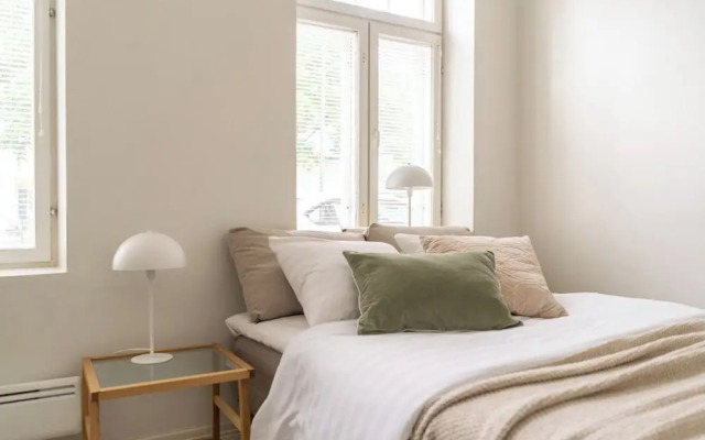 A bright wooden studio for four