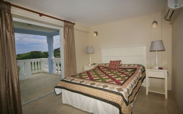 Fairway And Ocean Views - Blue Moon 4 Bedroom Villa by RedAwning