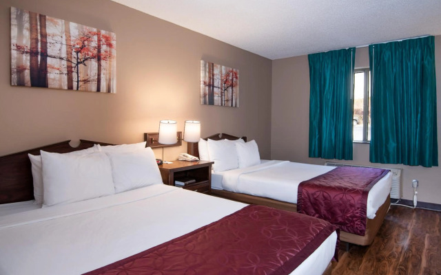Guest Inn & Suites - Midtown Medical Center