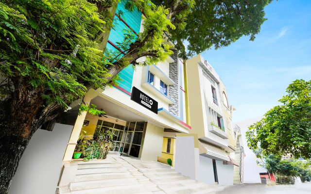 Super Hotel O Karakambadi Road Near Leela Mahal Circle