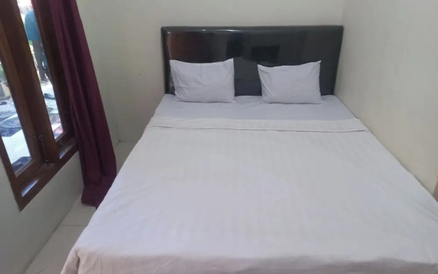 Hotel O Chimi Rumah Kost