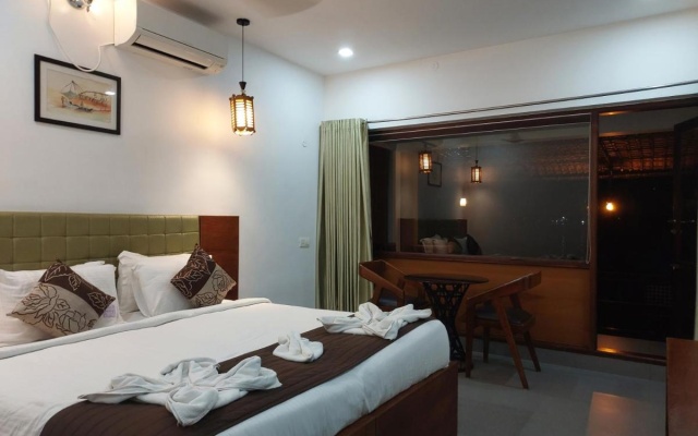 Mira's PMC Lakeshore Resort – Guest Rooms – Muhamma