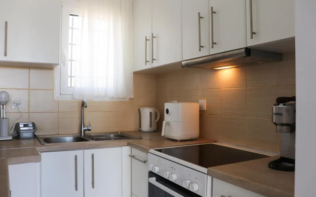 Ateni House