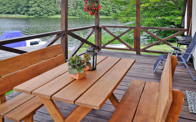 Holiday Home by Lake Rosnowskie With Boat