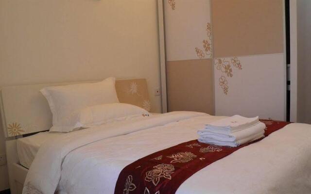 Shengang Hotel Apartment