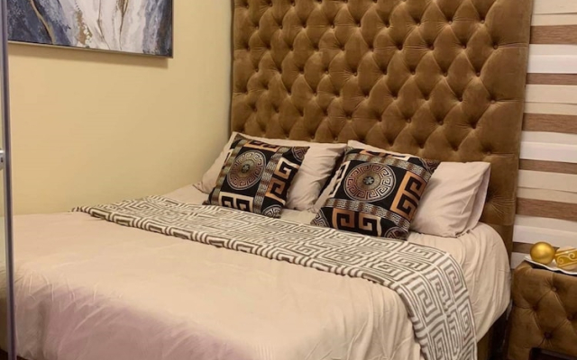 OYO 936 Yumis Condotel Trees Residences