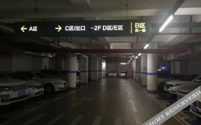 Xinyueju Boutique Apartment (Shishi Clothing City Shimao Skyscraper City Branch)