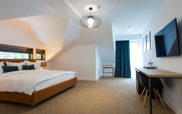 Отель UpperHouse Suites & More