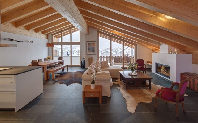 Mountain Exposure Luxury Chalets & Penthouses & Apartments