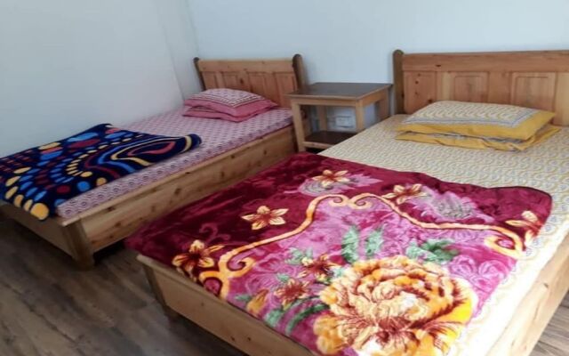 Goroomgo Lotus Born Homestay Darjeeling