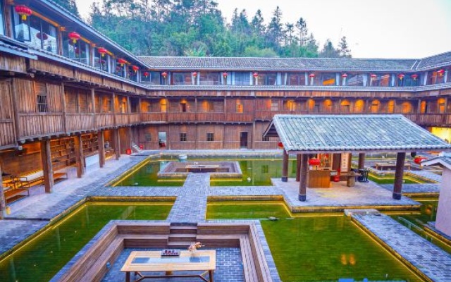 Yongding Earth Building Duilu · Shengheng Building World Heritage Home Stay – Exterior – Longyan