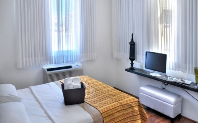 Casa Condado Residences and Hotel Room
