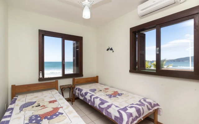 Aluguel Casa 4 quartos 1 suite frente mar 016