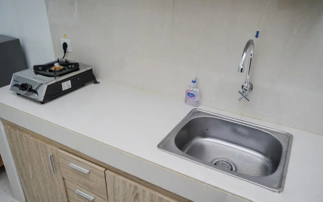 Fully Furnished with Cozy Design Studio Apartment at Springwood Residence