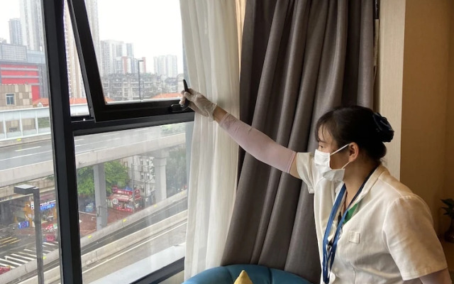 Kaigaosi Hotel (Guangzhou Railway Station Subway Station Baima Clothing City)