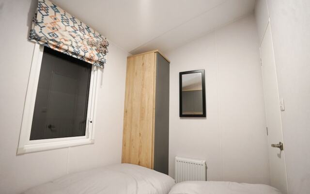 Inviting 3-bed Lodge in Preston hot tub