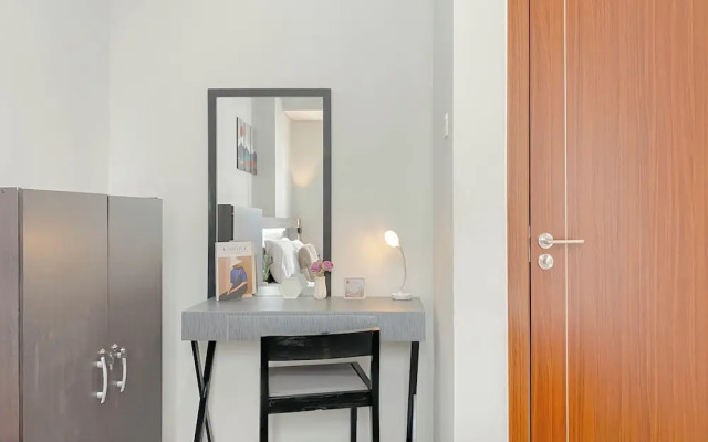 Minimalist 1Br Apartment At Vittoria Residence