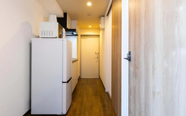 Mr.KINJO in front of Manza Beach