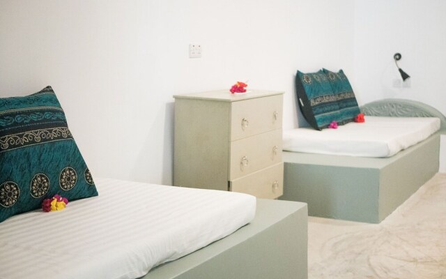 Neema Barefoot Beach House