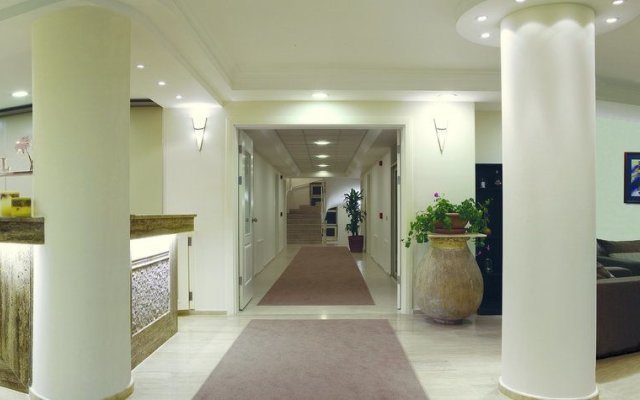 Kamer Suites & Hotel