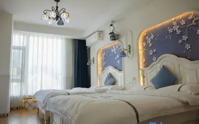 Hengfeng Theme Hotel (Xuanwei Railway Station Branch)